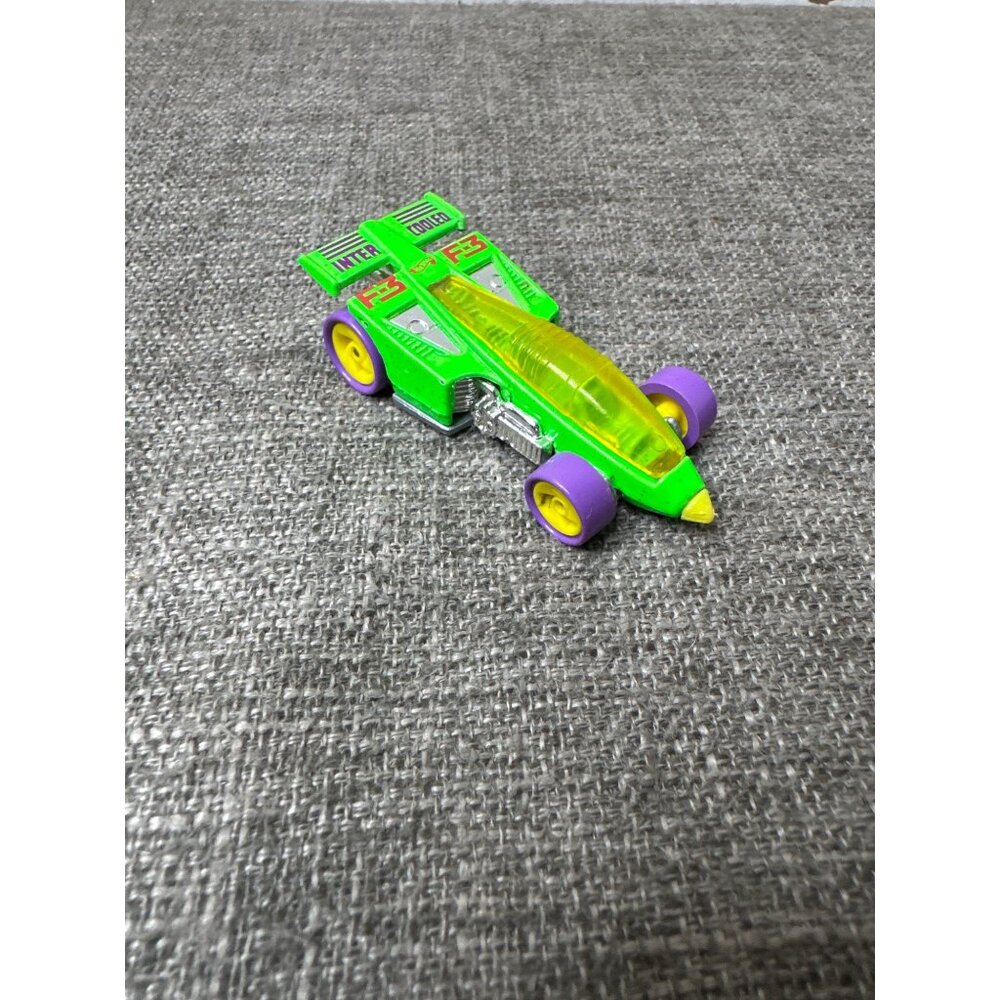 Hot Wheels 1997 Inter-Cooled Green Die-Cast Car With Purple Wheels